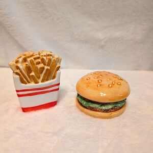 Vintage salt and pepper shakers hamburger  and fries.